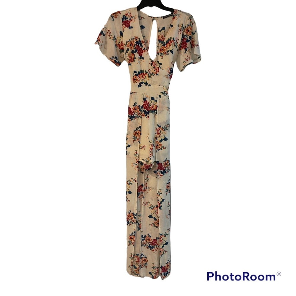 Floral Short v-neck romper (front) w/ a long maxi skirt w/an open back